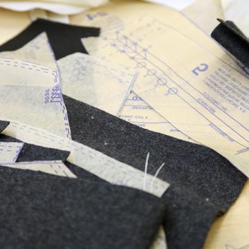 Patterns and cloth on a work table in the fashion merchandising area